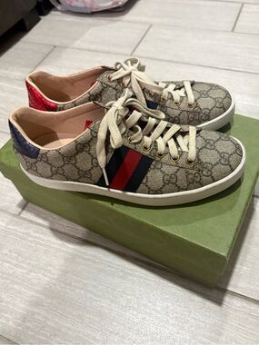 Gucci Beige Monogram Low-Top Sneakers with Red & Blue Stripe